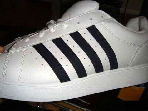 fake adidas 4 stripes|Adidas 3 Stripe shoes.